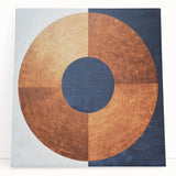 Abstract geometric canvas artwork showcasing vibrant colors and dynamic shapes, perfect for modern home decor. This stretched design leans against a neutral wall, enhancing contemporary aesthetics.