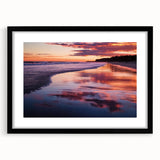 Black-framed landscape artwork depicting serene beaches under a clear blue sky, showcasing gentle waves and vibrant sand, ideal for home decor.