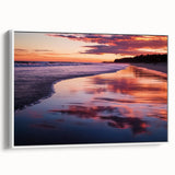 Framed canvas artwork depicting a serene beach landscape with vibrant colors, showcasing gentle waves and a clear sky, ideal for coastal home decor.