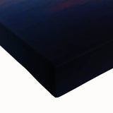 Close-up of a stretched canvas depicting a vibrant beach landscape, showcasing soft waves, golden sand, and a clear blue sky, ideal for coastal decor.