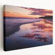 Stretched canvas artwork displaying a vibrant beach landscape, showcasing bright blue skies, golden sands, and lush palm trees, ideal for coastal-themed decor.
