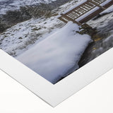 Landscape bridge artwork on rolled canvas, showcasing vibrant colors and intricate details, elegantly packaged in a protective cardboard tube for art enthusiasts.