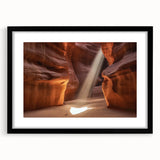 Black-framed landscape art print showcasing vibrant canyons in rich earth tones, with a white mat for added elegance, perfect for home decor enhancement.