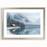 Silver-framed landscape artwork featuring a serene countryside scene with a mat, showcasing rich green fields and a blue sky, perfect for home decor.