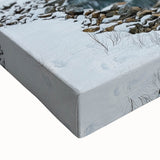 Close-up of a vibrant stretched canvas depicting a serene countryside landscape, showcasing lush green fields and a clear blue sky, perfect for home decor.