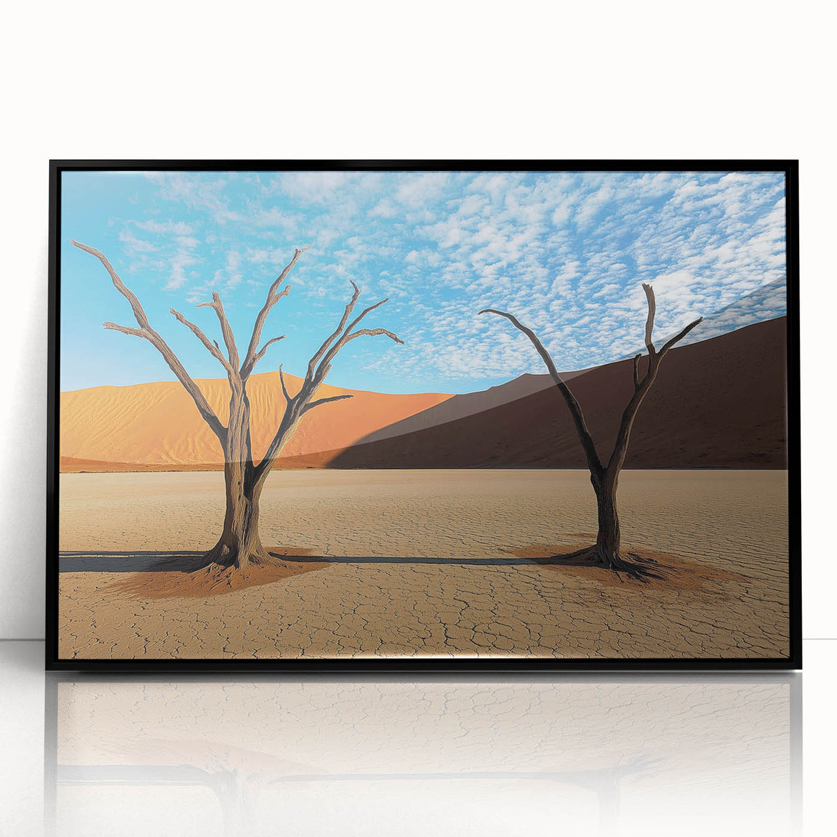 Framed acrylic artwork showcasing a desert landscape with vibrant colors and intricate details, set in a sleek black frame, perfect for home decor.