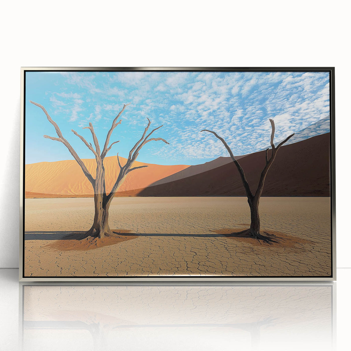 Framed acrylic artwork showcasing a stunning desert landscape with vibrant colors, set in a sleek silver frame, perfect for modern home decor.