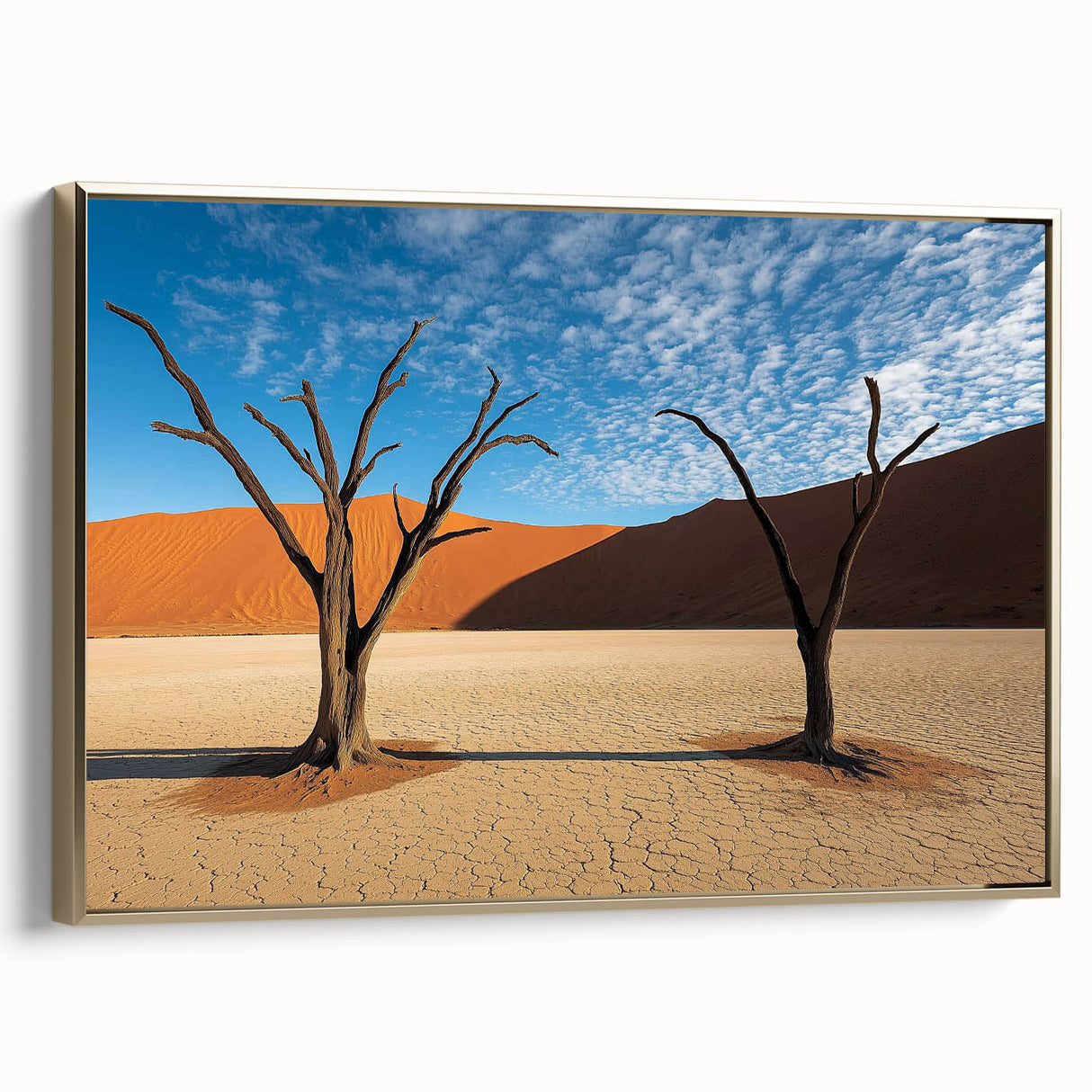 Framed canvas artwork showcasing a desert landscape with golden hues, side view highlights its elegant frame, perfect for modern home decor and art enthusiasts.