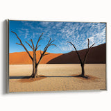 Framed canvas artwork showcasing a serene desert landscape with silver accents, highlighting warm earth tones and detailed textures, perfect for modern home decor.