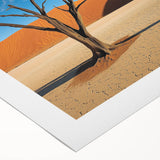 Desert landscape rolled canvas art showcasing vibrant orange and yellow hues with textured details, elegantly packaged in a protective cardboard tube for safe delivery. This piece enhances any modern decor with its striking desert imagery.