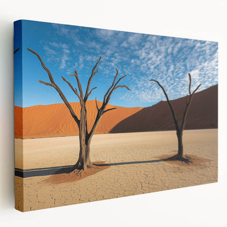 Stretched canvas artwork depicting a serene desert landscape with warm tones of orange and beige, showcasing rolling sand dunes and a clear blue sky, perfect for home decor.