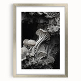 Textured abstract art print in shades of gray and white, framed in silver, ideal for bedroom wall decor.