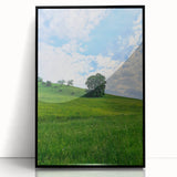 Large abstract wall art depicting spring themes in soft green and yellow tones on a black framed acrylic.