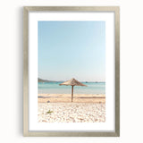 Textured abstract art print in warm orange and yellow tones, framed in silver, ideal for bedroom decor.