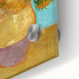 Large abstract wall art depicting a swirling sky in blue and yellow tones on acrylic glass.