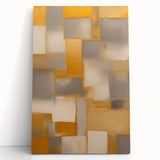Abstract wall art featuring vibrant strokes in shades of blue, orange, and yellow on stretched canvas, leaning against a neutral wall, perfect for modern decor.