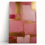 Abstract wall art featuring colorful strokes in hues of blue, pink, and gold on a stretched canvas, elegantly leaning against a white wall, adding a modern touch to interior decor.