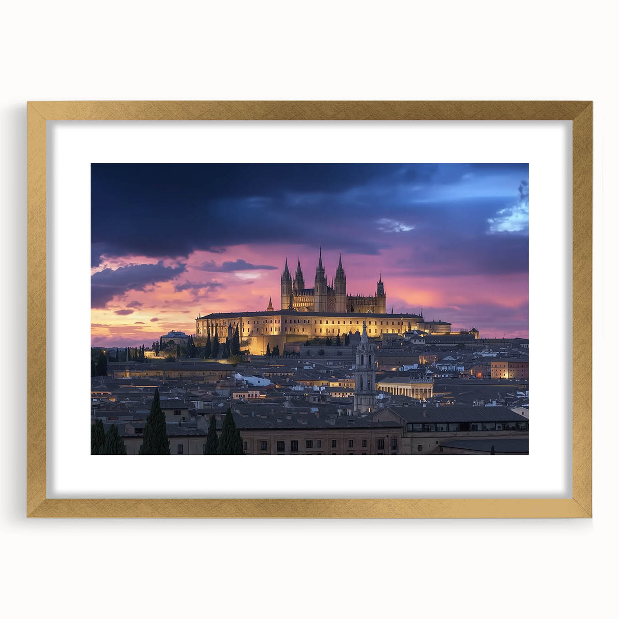 Elegant gold-framed landscape artwork depicting a serene castle scene, highlighted by a soft mat border, perfect for enhancing home decor aesthetics.