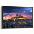 Framed canvas artwork showcasing a picturesque landscape with a medieval castle, featuring a sleek black frame and side view, perfect for home decor enhancement.