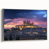 Framed canvas artwork showcasing a stunning castle landscape with silver accents, displayed in a side view to highlight its elegant design and texture.