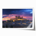 Rolled print showcasing a stunning landscape with a majestic castle set against a vibrant sunset, perfect for home decor, presented in protective packaging.