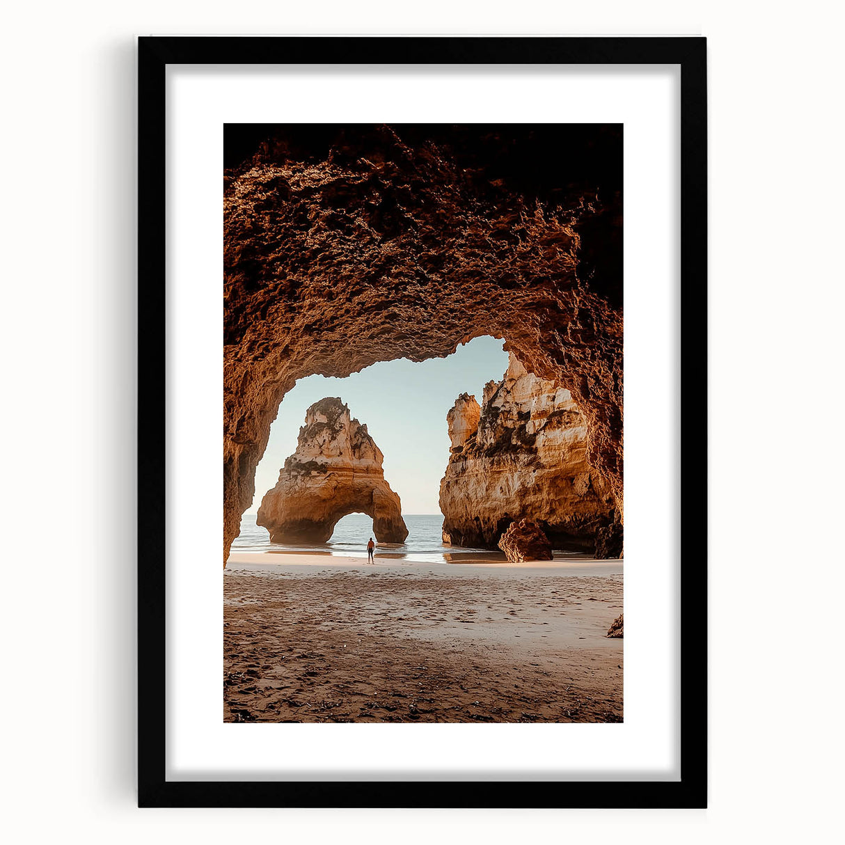 Elegant black-framed landscape cave art print with a white matting, showcasing intricate designs and natural colors, perfect for modern home decor.