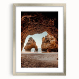 Framed silver landscape artwork depicting a serene cave scene, featuring a textured mat, ideal for home decor. Perfect for nature lovers and art enthusiasts alike.