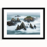 Framed landscape artwork depicting dramatic cliffs in a serene setting, featuring a black mat and sleek frame, ideal for modern home decor.