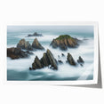 Stunning landscape print of dramatic cliffs and serene ocean waves, rolled and ready for framing, showcasing vibrant colors and intricate details. Perfect for enhancing home decor.