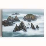 Stretched canvas print showcasing a stunning landscape of rugged cliffs under a vibrant sunset, perfect for home décor and nature-inspired interiors.