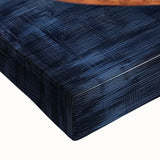 Close-up of abstract geometric stretched canvas artwork displaying vibrant colors and intricate patterns, ideal for modern home decor or office spaces.