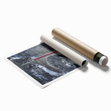 Rolled print of a landscape bridge artwork showcasing vibrant colors and intricate details, securely packaged in a protective cardboard tube for easy transport.