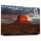 Landscape acrylic artwork depicting vibrant canyons in rich hues of orange and blue, displayed in a sleek glass frame with stylish pins for a modern touch.