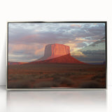 Framed acrylic artwork showcasing a stunning landscape of canyons with vibrant colors, perfect for home decor. The silver frame enhances the visual impact, ideal for modern interiors.