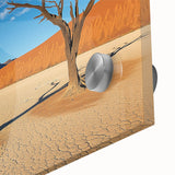 Close-up of a vibrant acrylic landscape depicting a desert scene, showcasing warm earth tones and intricate details, ideal for modern home decor.