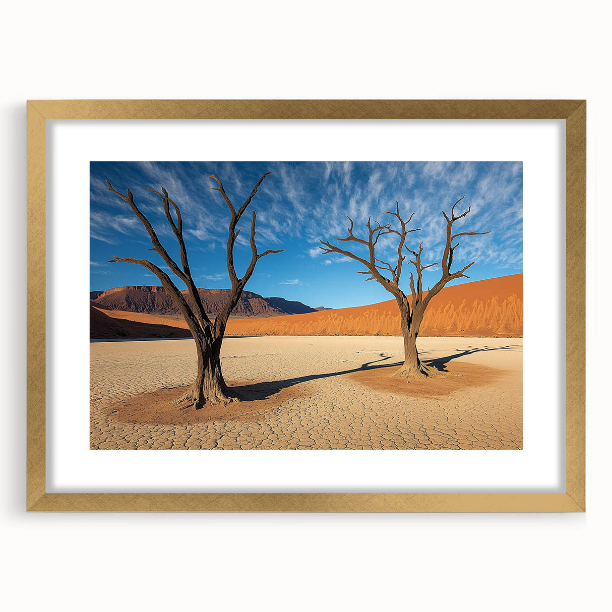 Desert landscape framed art piece with a gold mat, showcasing vibrant colors and intricate details, perfect for enhancing home decor in a stylish setting.
