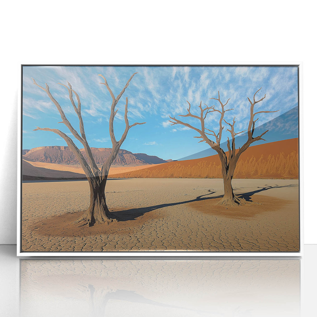 Framed acrylic artwork showcasing a vibrant desert landscape with warm hues of orange and yellow, set in a sleek white frame, perfect for modern home decor.