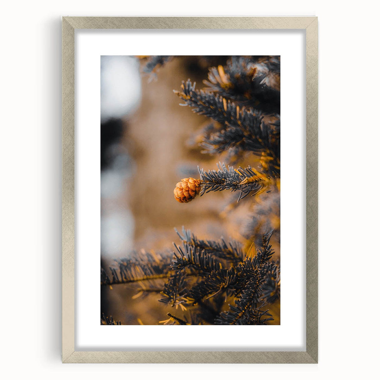 Textured abstract art print in warm autumn hues on a silver-framed canvas, suitable for bedroom decor.