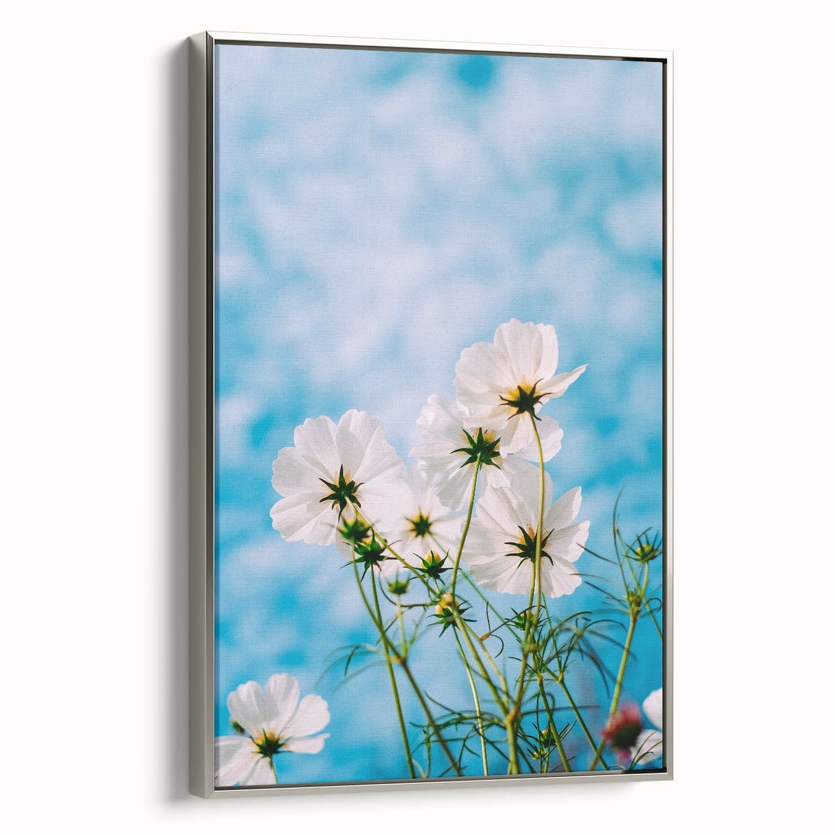 Framed canvas depicting a vintage landscape painting with colorful spring scenery.