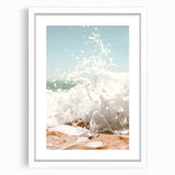 Abstract art print featuring swirling patterns in warm orange and yellow tones on a white framed canvas.