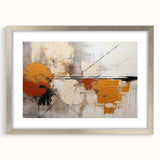 Abstract wall art featuring dynamic strokes in shades of blue and gold, framed in silver with a white mat, ideal for modern home decor and artistic enhancement.