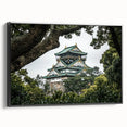 Framed canvas artwork depicting a scenic landscape with a castle, showcasing vibrant colors and intricate details, presented in a sleek black frame. Ideal for home decor and art enthusiasts.