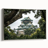 Framed canvas artwork depicting a serene landscape with a majestic castle, featuring a silver frame that enhances its elegant presentation, perfect for home decor.