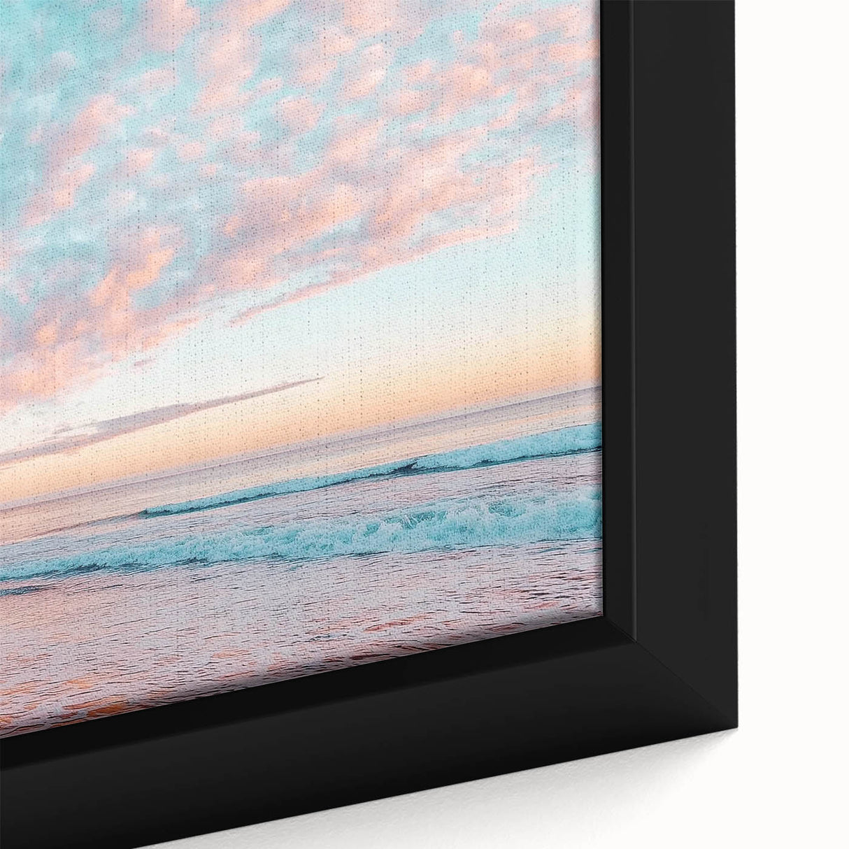 Framed close-up of a vibrant beach landscape canvas print showcasing vivid blues and sandy tones, perfect for coastal decor enthusiasts. Ideal for brightening living spaces.