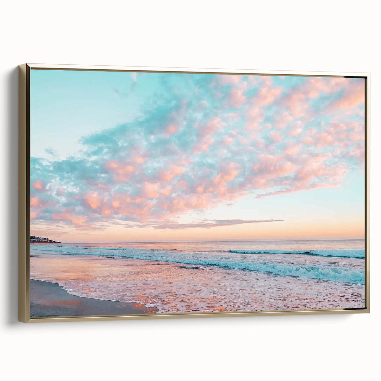 Framed canvas artwork depicting a serene beach landscape with golden accents, showcasing tranquil waves and soft sand, perfect for home decor or coastal-themed interiors.