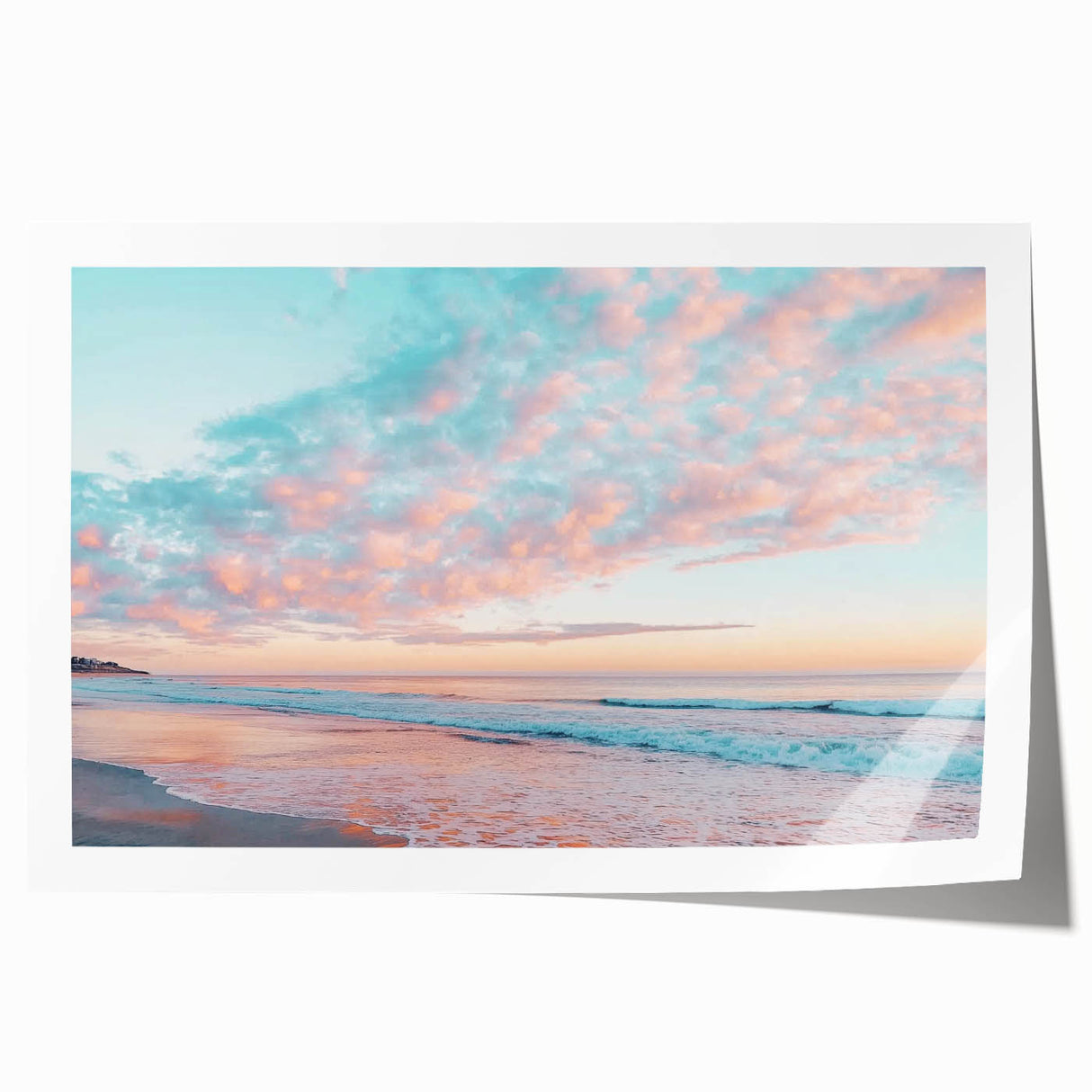 Vibrant rolled print showcasing a serene beach landscape with soft waves and palm trees, packaged in a durable cardboard tube for safe delivery. Ideal for coastal decor enthusiasts and art lovers seeking a calming aesthetic.