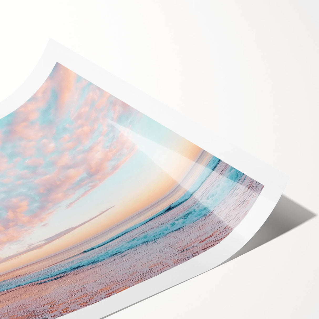 Stunning landscape canvas print showcasing a serene beach scene with vibrant colors and gentle waves, rolled and securely packaged in a protective cardboard tube for easy transport.