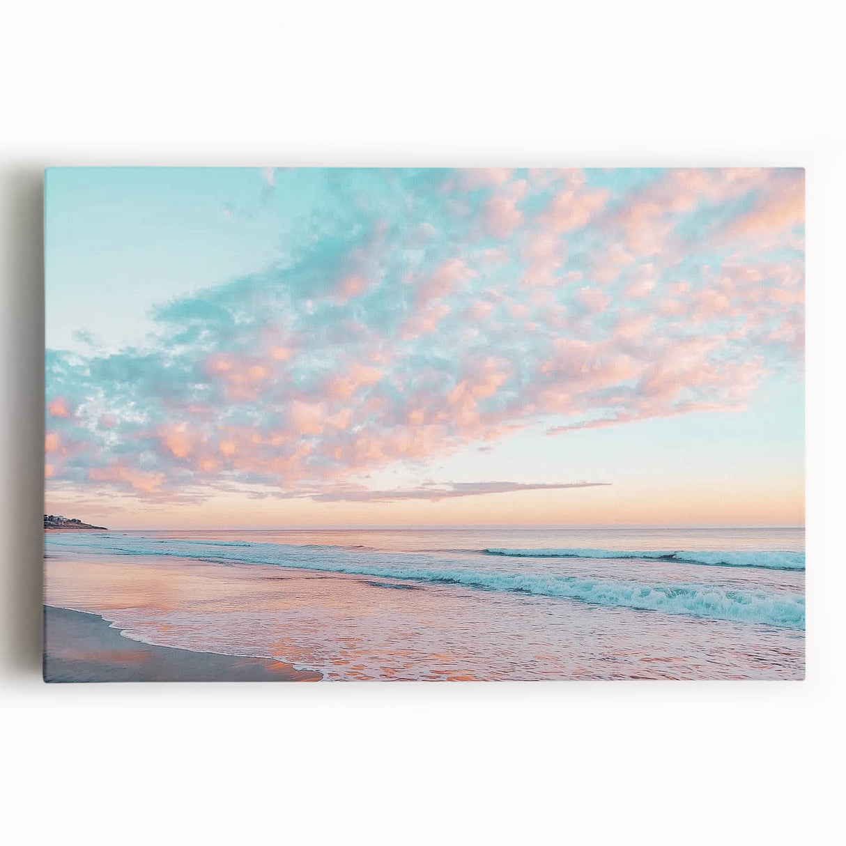 Stretched canvas depicting a serene beach landscape at sunset, featuring vibrant colors and soft waves, perfect for enhancing coastal-themed decor.