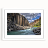 Landscape artwork of canyons in earthy tones, framed in a sleek white mat, showcasing stunning natural scenery and intricate details, perfect for home decor.