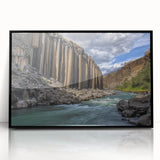 Framed acrylic artwork showcasing a stunning landscape of canyons, featuring rich earth tones and textured details, perfect for enhancing any modern decor.